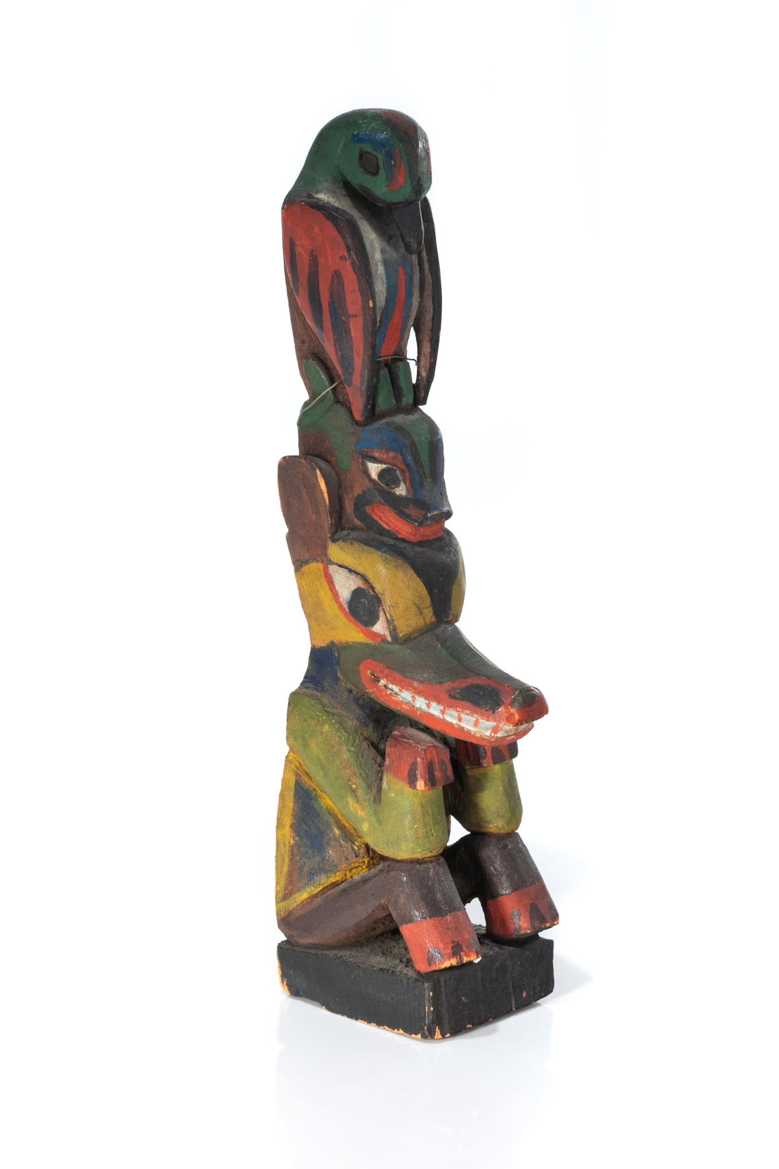 UNIDENTIFIED NUU-CHAH-NULTH ARTIST, Model Totem Pole, c. 1930s: UNIDENTIFIED NUU-CHAH-NULTH ARTIST Model Totem Pole, c. 1930s carved wood and pigment, 11.75 x 2.5 x 3.5 in (29.8 x 6.3 x 8.9 cm) unsigned; carved in a stacked arrangements raven [?], atop a frog {?},