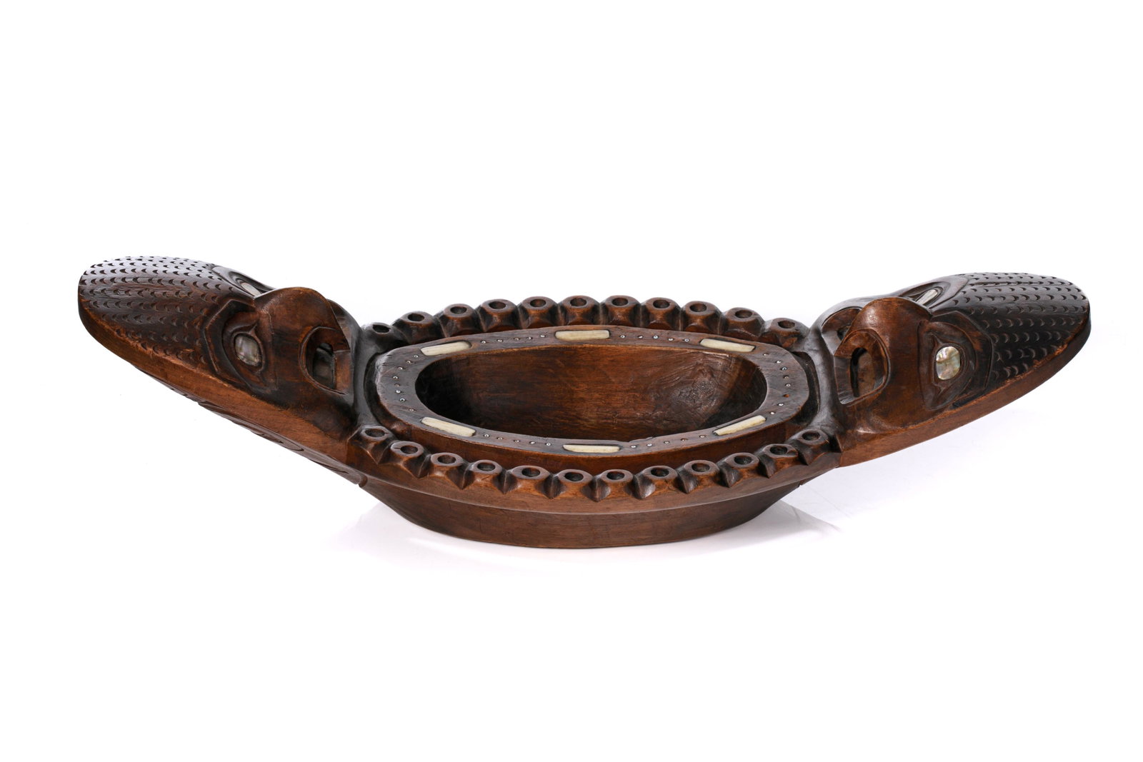 UNIDENTIFIED ARTIST, Probably HAIDA or TLINGIT, Feast Bowl, c. 1910: UNIDENTIFIED ARTIST, Probably HAIDA or TLINGIT Feast Bowl, c. 1910 cedar wood, glass beads, abalone, and tusk, 4.5 x 17 x 7 in (11.4 x 43.2 x 17.8 cm) unsigned. Provenance Issacs Gallery, Toronto;Acqu