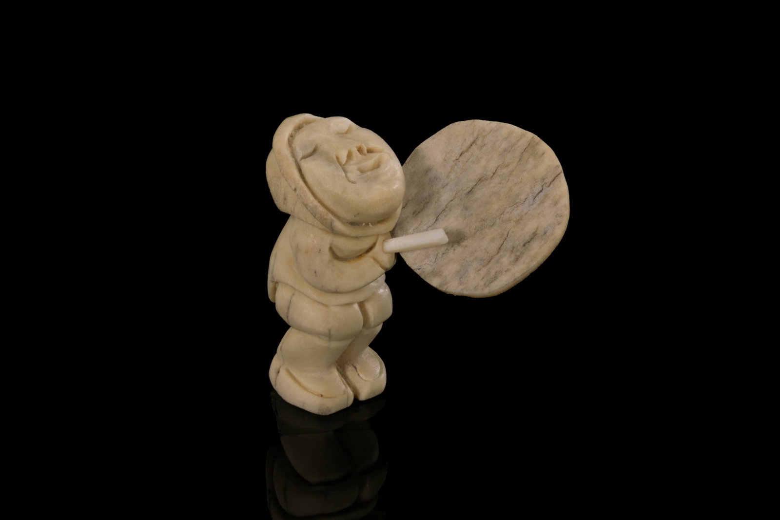 SILAS KAYAKJUAK, INUIT, Drum Dancer, 2004: SILAS KAYAKJUAK (QAYAQJUAQ) (1956-) SANIRAJAK (HALL BEACH) Drum Dancer, 2004 antler, 2 x 1.25 x 2 in (5.1 x 3.2 x 5.1 cm) signed and "SILAS / ᓴᐊᓚᓯ / 04" Provenance Private Coll