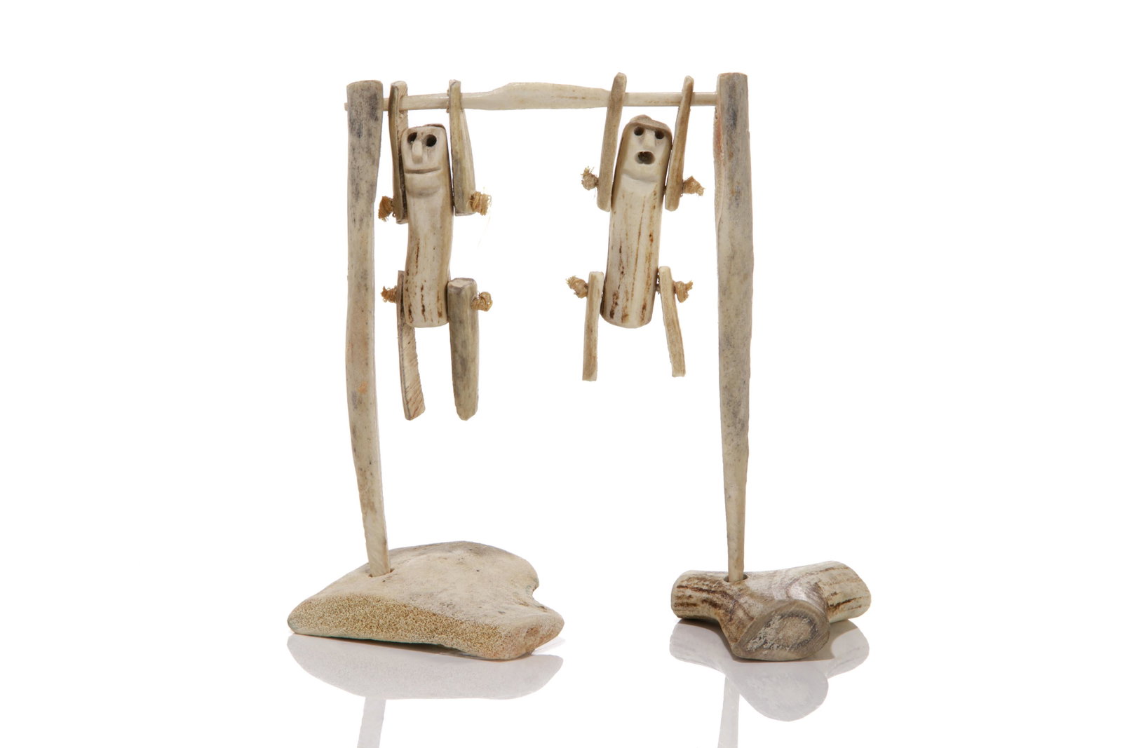 SARAH ALAREAK IOOTNA, INUIT, Swinging Men, mid 1970s: SARAH ALAREAK IOOTNA (1926-D) ARVIAT (ESKIMO POINT) Swinging Men, mid 1970s antler and sinew, 5.5 x 5 x 2.25 in (14 x 12.7 x 5.7 cm) unsigned; given to the artist and titled to the accompanying igloo 
