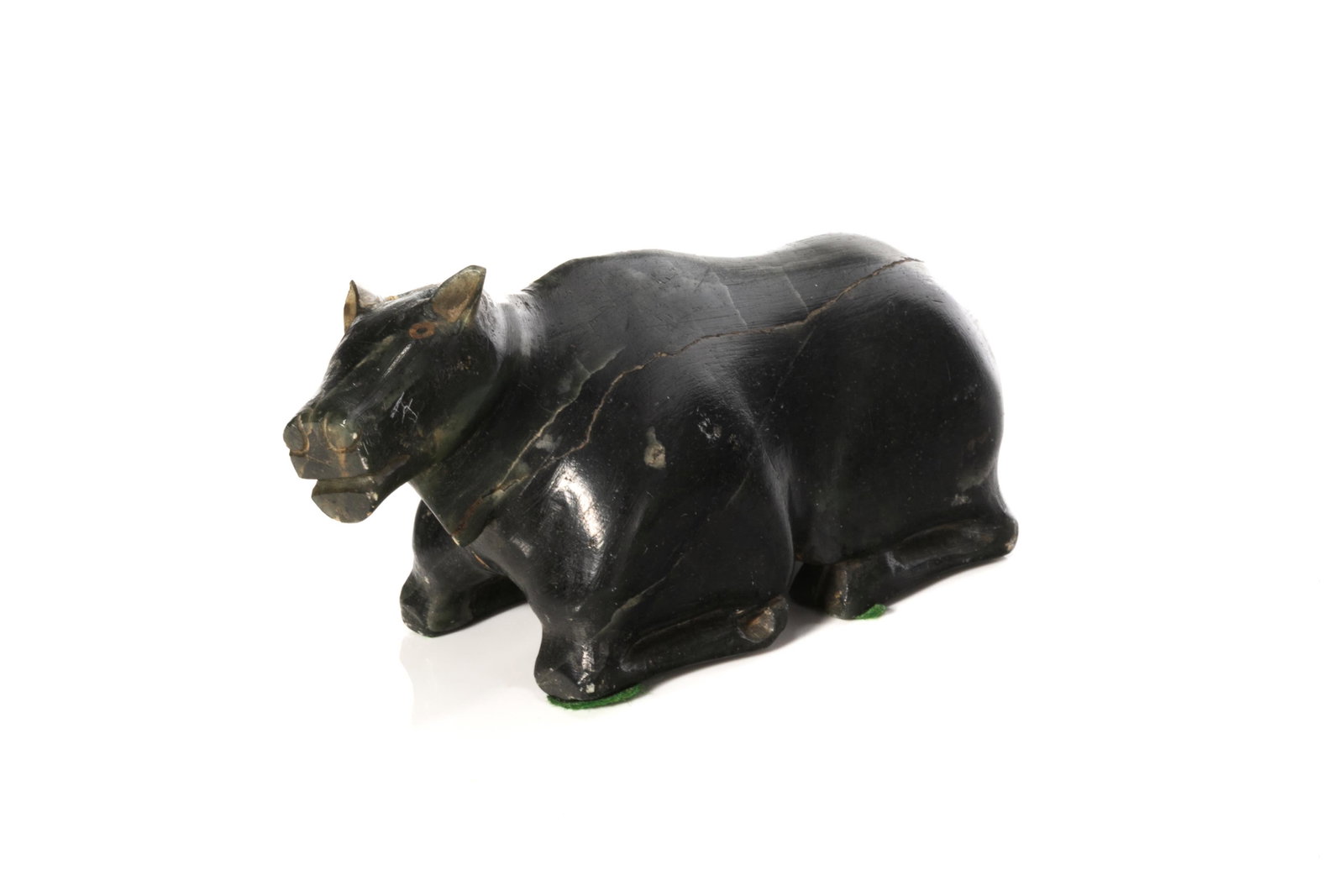 UNIDENTIFIED INUIT ARTIST, Resting Caribou, 1970s: UNIDENTIFIED INUIT ARTIST, INUKJUAK (PORT HARRISON) Resting Caribou, 1970s stone, 3.75 x 4.5 x 1.75 in (9.5 x 11.4 x 4.4 cm) unsigned. Provenance Private Collection, Michigan. A charming, petite work 