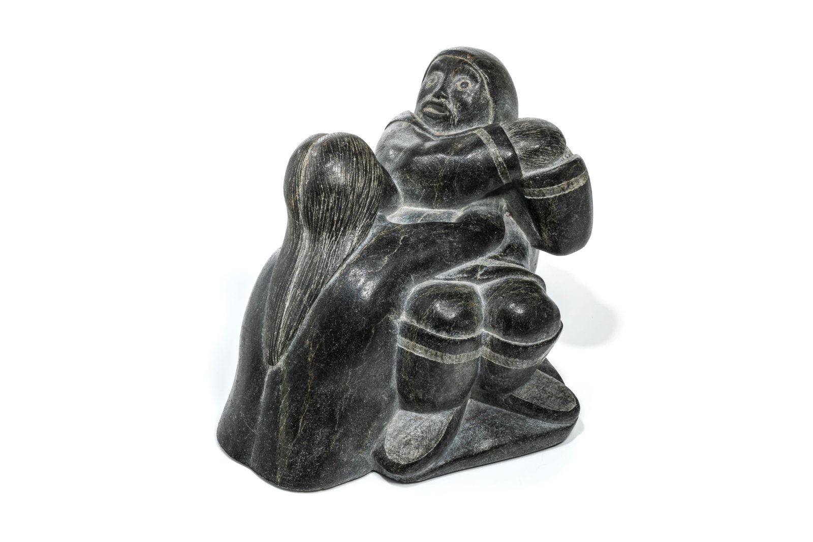 MARK O., INUIT, Hunter with Sea Spirit, mid-late 1970s: MARK O., NUNAVIK (ARCTIC QUEBEC) Hunter with Sea Spirit, mid-late 1970s stone, 4.5 x 6.5 x 4.5 in (11.4 x 16.5 x 11.4 cm) signed, "MARK O." Provenance Private Collection, Michigan, USA. The assumed su