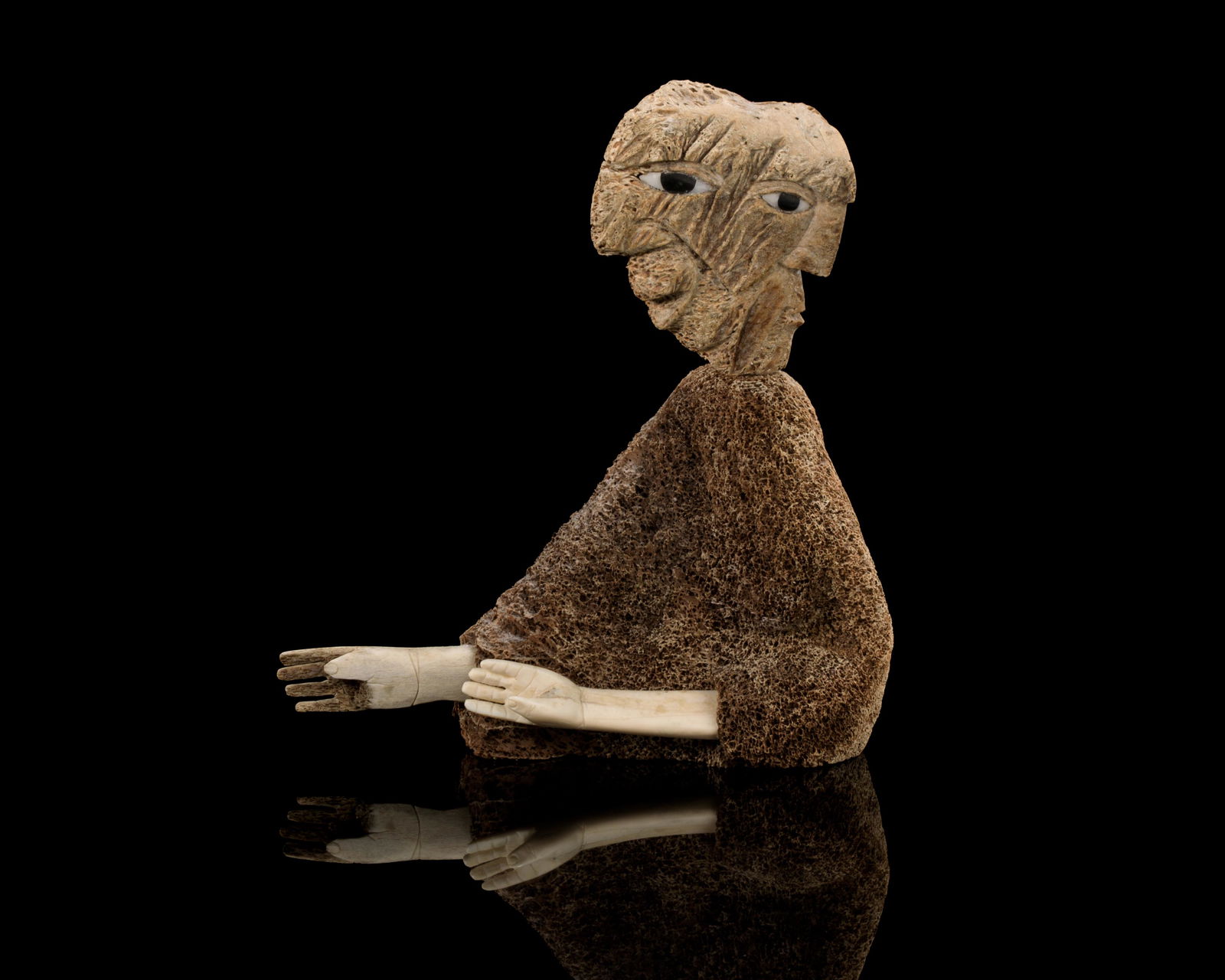 VINCE BOMBERRY (1958-) KANIENKAHAGEN (MOHAWK), Four Faces Figure with Inset Arms, late 1980s / early: VINCE BOMBERRY (1958-) KANIENKAHAGEN (MOHAWK) Four Faces Figure with Inset Arms, late 1980s / early 1990s probably moose bone, stone, and antler, 10.5 x 9.5 x 4.75 in (26.7 x 24.1 x 12.1 cm) signed, "