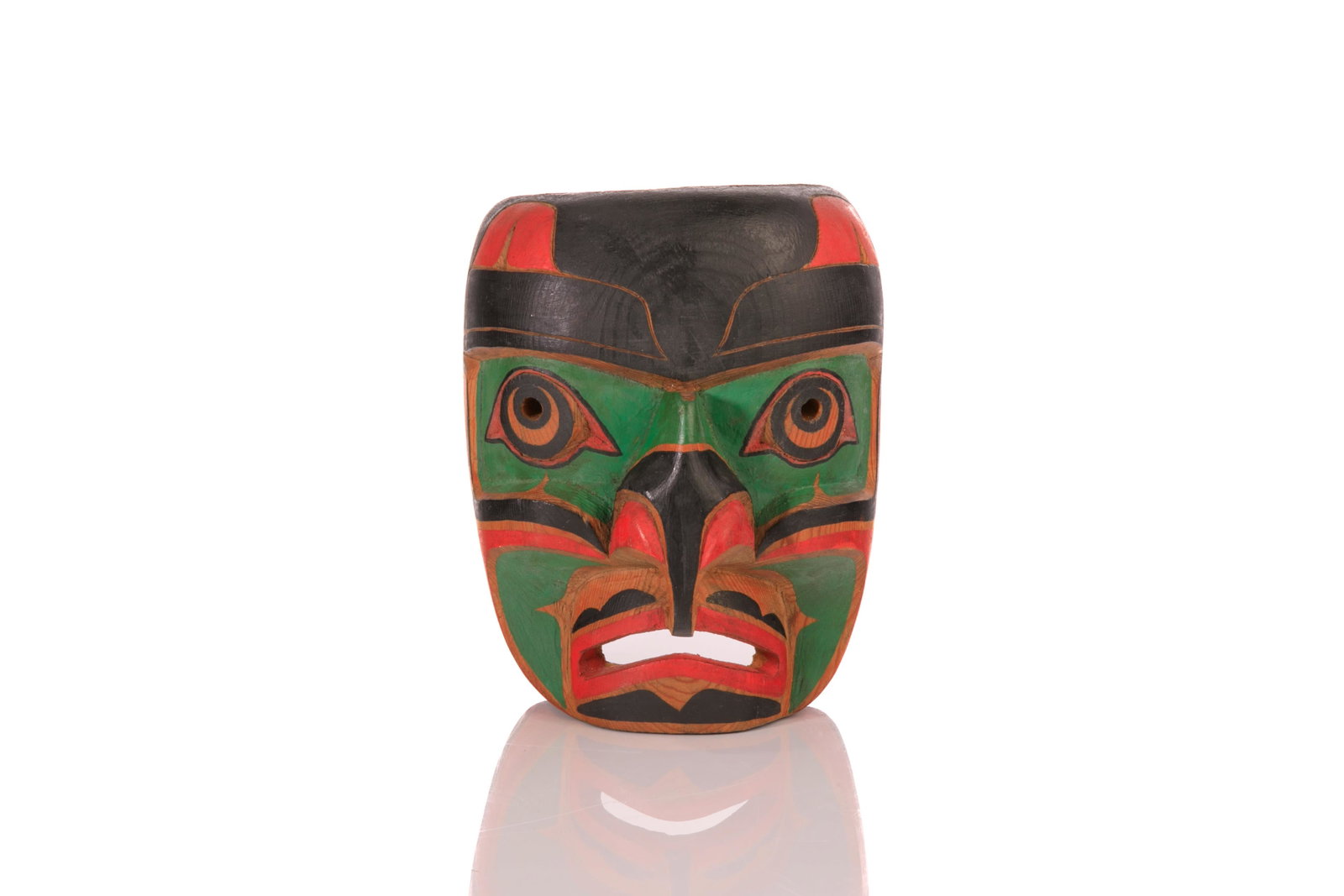 ALEX HUNT, KWAKWA̱KA̱ʼWAKW, Kwakiutl Hawkman Mask, 1 December 1984: ALEX HUNT, KWAKWA̱KA̱'WAKW Kwakiutl Hawkman Mask, 1 December 1984 carved and painted cedar wood, string, 7 x 6 x 4 in (17.8 x 15.2 x 10.2 cm) signed, titled, and dated, "Alex Hunt / Kwa