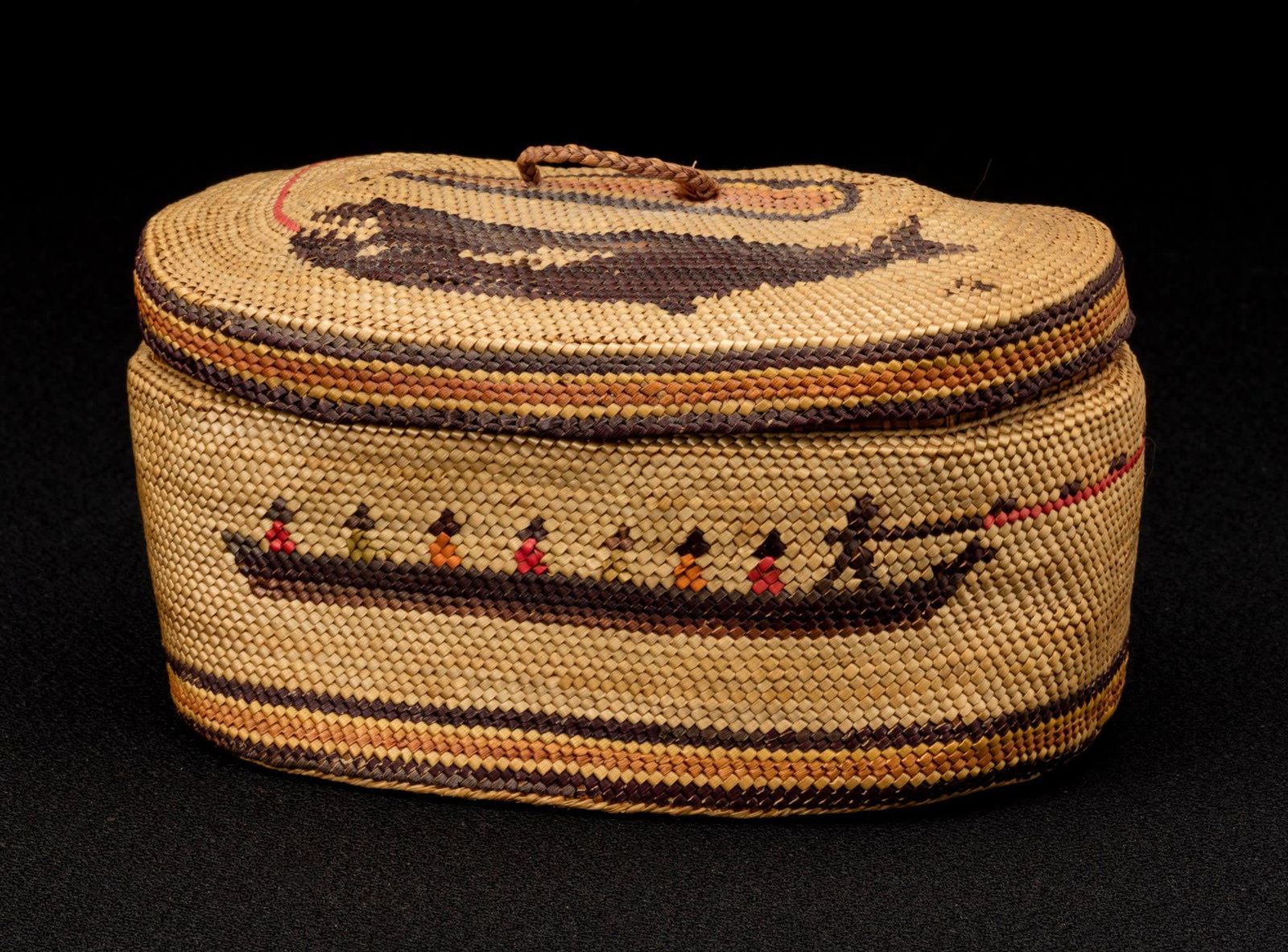 UNIDENTIFIED MAKER, NUU-CHAH-NULTH or MAKAH, Lidded Pictorial Trinket Basket, c. 1890: UNIDENTIFIED MAKER, NUU-CHAH-NULTH or MAKAH Lidded Pictorial Trinket Basket, c. 1890 split cedar bark, natural and dyed bear grass, 2.5 x 4.5 x 3 in (6.3 x 11.4 x 7.6 cm) unsigned. Provenance A Vancou