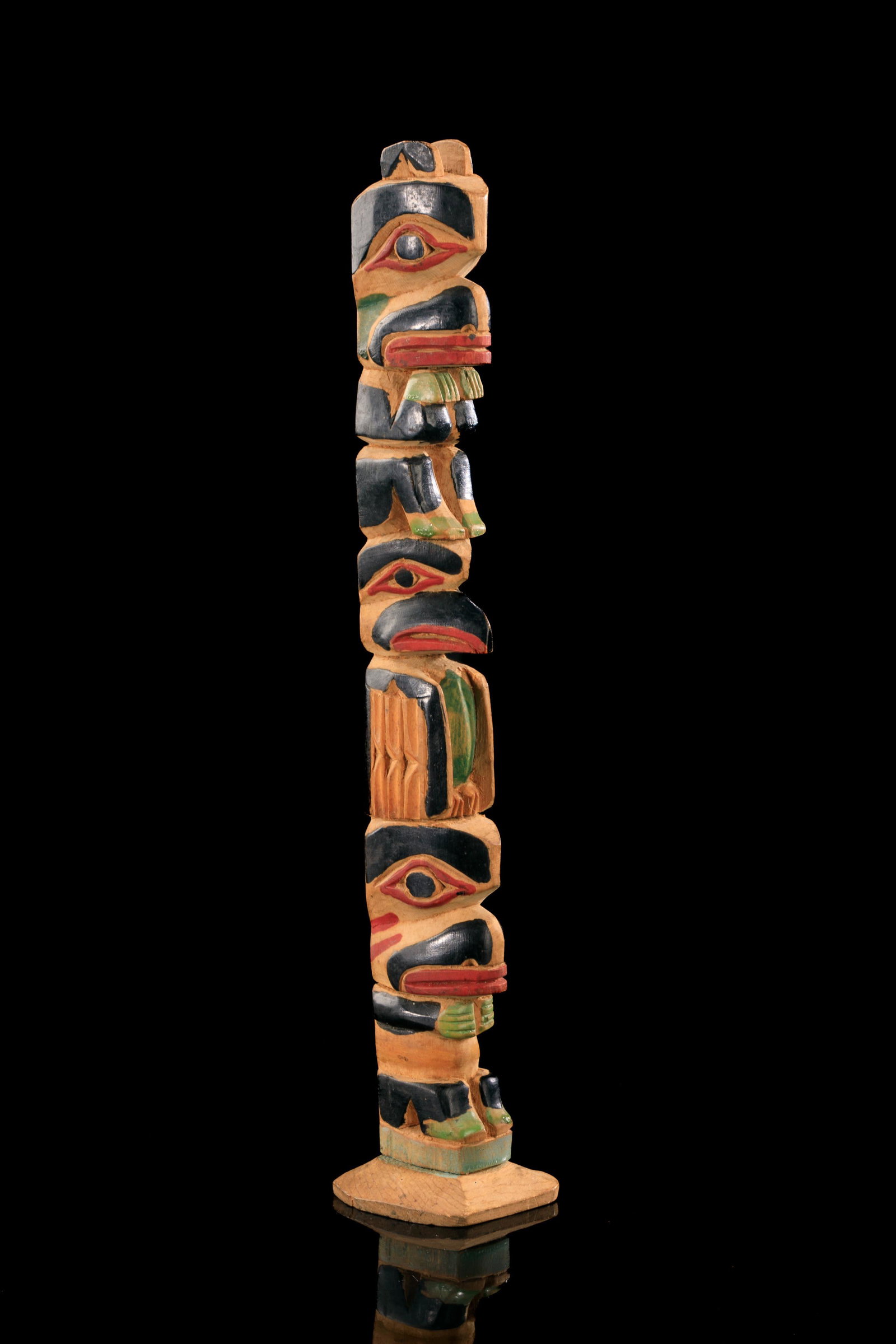JAMES RUDOLPH (1858-1933) TLINGIT, JUNEAU, ALASKA, Model Totem Pole, c. 1920s: JAMES RUDOLPH (1858-1933) TLINGIT, JUNEAU, ALASKA Model Totem Pole, c. 1920s carved and painted cedar, 10 x 2 x 1.75 in (25.4 x 5.1 x 4.4 cm) unsigned; inscribed in graphite in an unknown hand, "cme [