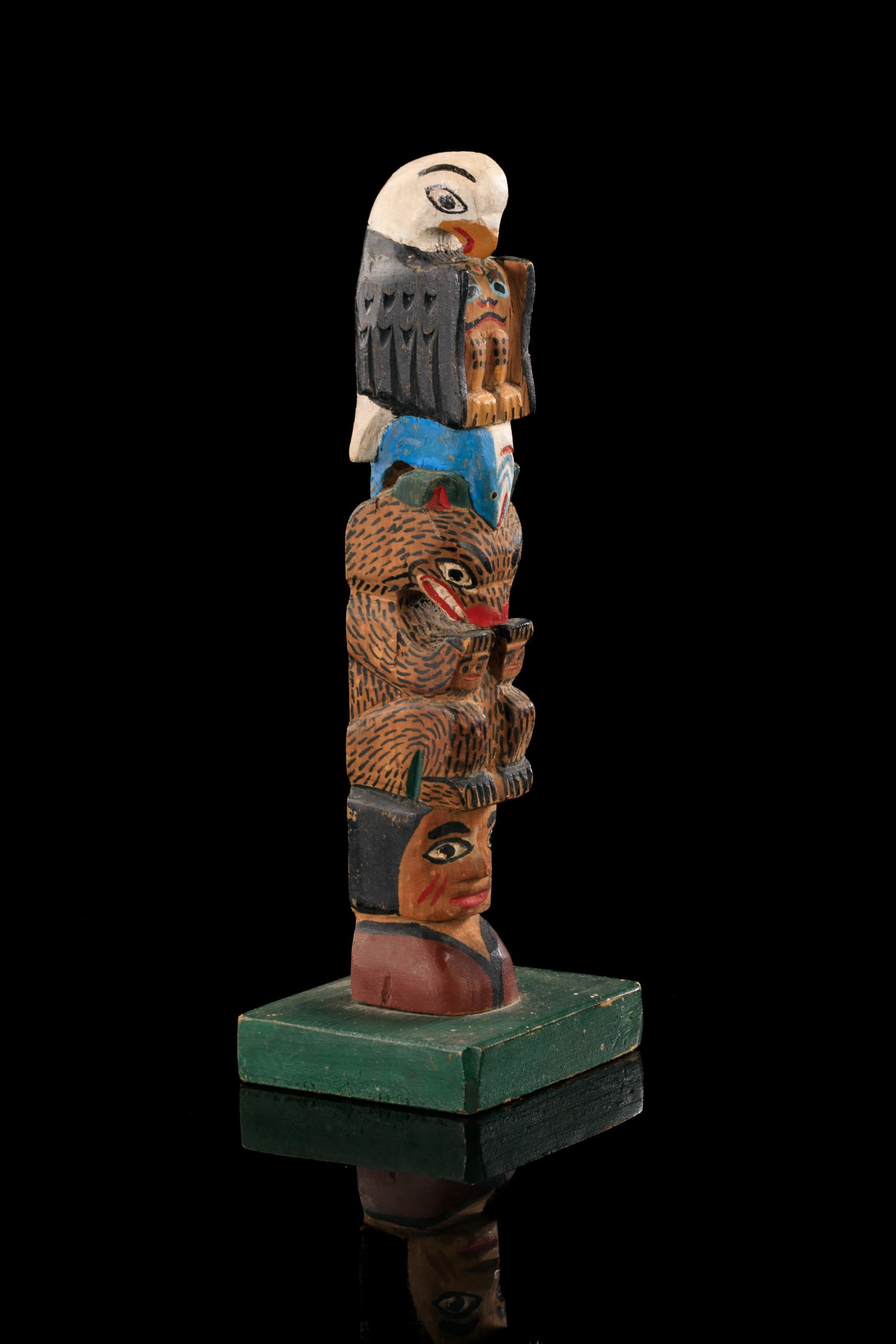 ELI TAIT (1872-1949) TSIMSHIAN, METLAKATLA, ALASKA, Model "Good Luck" Totem Pole, c. 1920-30: ELI TAIT (1872-1949) TSIMSHIAN, METLAKATLA, ALASKA Model "Good Luck" Totem Pole, c. 1920-30 carved and painted cedar wood, 8 x 3 x 2.5 in (20.3 x 7.6 x 6.3 cm) unsigned. Provenance Private Collection,