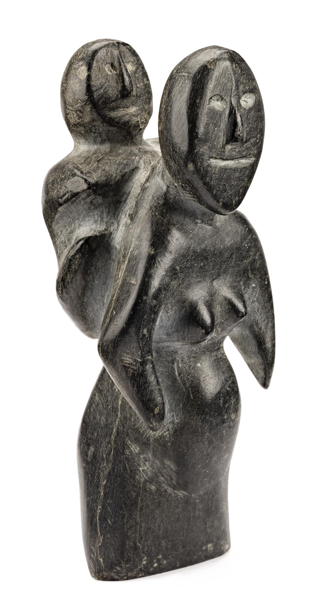 JOHN KAVIK, INUIT, Pregnant Mother and Child, 1964: Lot 71 JOHN KAVIK (1897-1993) KANGIQLINIQ (RANKIN INLET) Pregnant Mother and Child, 1964 stone, 5.75 x 2.75 x 2 in (14.6 x 7 x 5.1 cm) unsigned; inscribed in an unknown hand, "M 192"; inscribed "284"