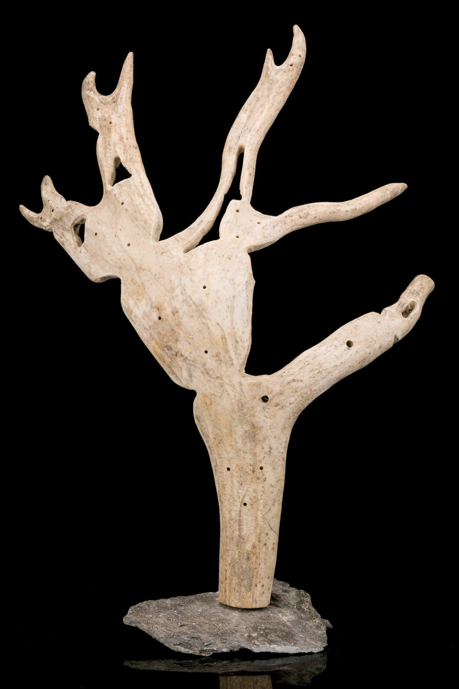 LUKE ANOWTALIK, INUIT, Community, c. 1990: LUKE ANOWTALIK (1932-2006) ARVIAT (ESKIMO POINT) Community, c. 1990 stone and antler, 21 x 14 x 12 in (53.3 x 35.6 x 30.5 cm) unsigned; given to the artist on the accompanying igloo tag. Provenance A