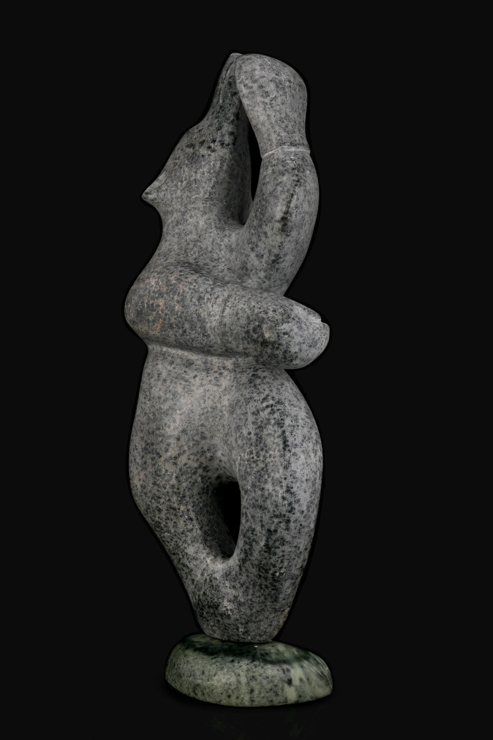 ABRAHAM ANGHIK RUBEN, INUIT, Bear Shaman, 1990s: ABRAHAM ANGHIK RUBEN, O.C. (1951-), PAULATUK / SALT SPRING ISLAND, B.C.. Bear Shaman, 1990s stone, 25.25 x 9.5 x 5 in (64.1 x 24.1 x 12.7 cm) unsigned. Provenance A Toronto Collection. In his