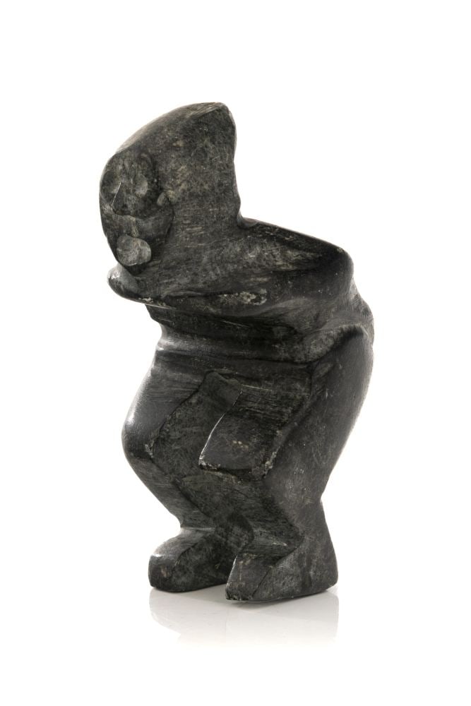 JOHN KAVIK, INUIT, Crouching Man, c. 1970: JOHN KAVIK (1897-1993) KANGIQLINIQ (RANKIN INLET) Crouching Man, c. 1970 stone, 5 x 2.5 x 3.5 in (12.7 x 6.3 x 8.9 cm) unsigned. Provenance Collection of John and Joyce Price, Seattle. One of th