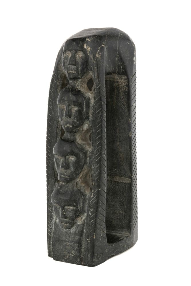 VITAL OKOKTOK, INUIT, Totemic Composition, c. mid 1960s: VITAL OKOKTOK (1912-D) KANGIQLINIQ (RANKIN INLET) Totemic Composition, c. mid 1960s stone, 9.5 x 3.25 x 3.25 in (24.1 x 8.3 x 8.3 cm) signed, "OKOTOK". Provenance Collection of John and Joyce Price, S