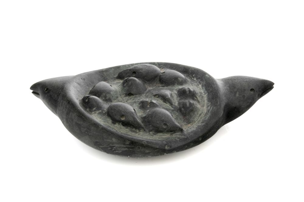 MIRIAM NANURLUK QIYUK, INUIT, Birds with Nest, mid 1980s: MIRIAM NANURLUK QIYUK (1933-2016), QAMANI'TUAQ (BAKER LAKE) Birds with Nest, mid 1980s stone, 0.75 x 4.75 x 2.75 in (1.9 x 12.1 x 7 cm) signed, "MRS QIYUK". Provenance Collection of John and Joyce Pri