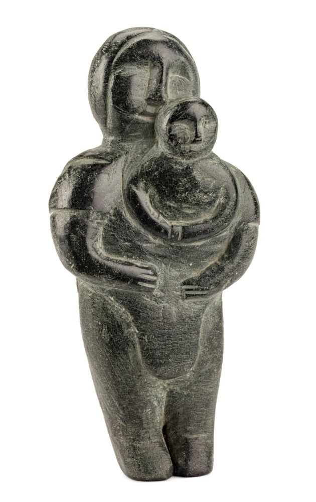 MIRIAM QIYUK, INUIT, Mother Holding a Child, 1970s: MIRIAM NANURLUQ QIYUK (1933-2016) QAMANI'TUAQ (BAKER LAKE) Mother Holding a Child, 1970s stone, 5.75 x 2.75 x 1.5 in (14.6 x 7 x 3.8 cm) signed with initials, "S.Q.". Provenance Collection of John and