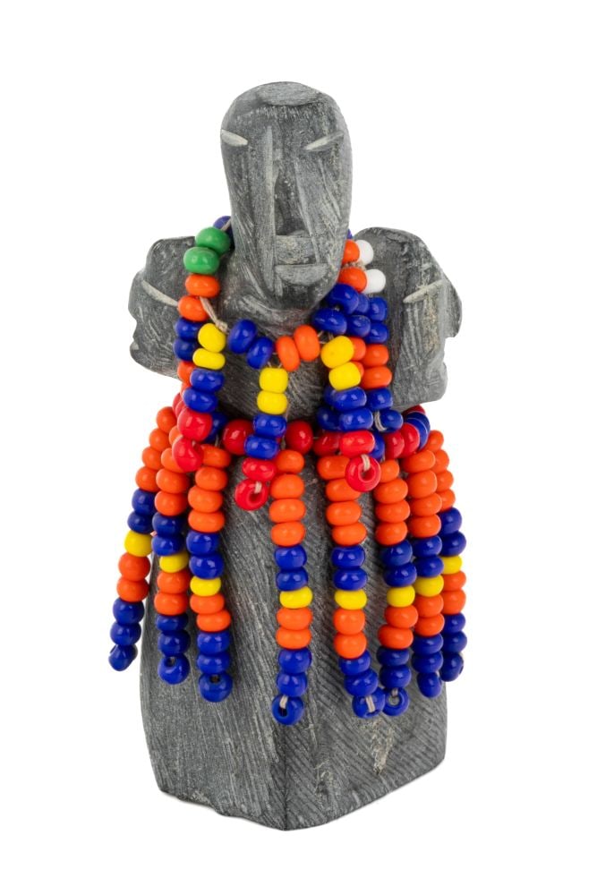 EVA TALOOKI, INUIT, Mother with her Two Children, c. 1990: EVA TALOOKI ALIKTILUK (1927-1994) ARVIAT (ESKIMO POINT) Mother with her Two Children, c. 1990 stone, beads, and cotton thread, 4 x 2 x 2 in (10.2 x 5.1 x 5.1 cm) unsigned. Provenance Collection of Joh