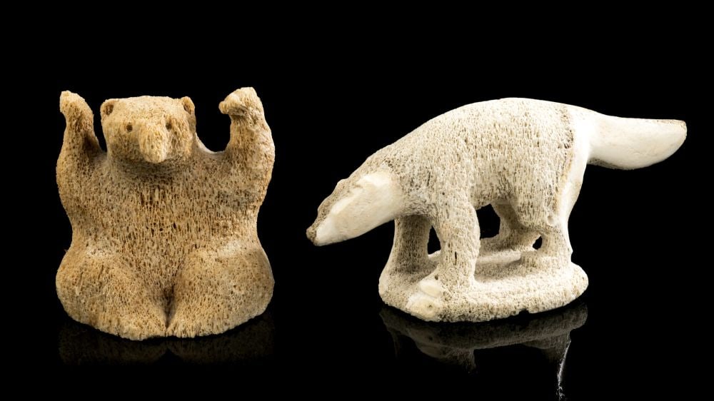 TWO UNIDENTIFIED INUIT ARTISTS, Dog and Polar Bear, 1970s / 1980s: TWO UNIDENTIFIED INUIT ARTISTS, EASTERN CANADIAN ARCTIC Dog and Polar Bear, 1970s / 1980s each whalebone, the dog: 3 x 6 x 2.5 in (7.6 x 15.2 x 6.3 cm) the bear, 3 x 3 x 2.5 in (7.6 x 7.6 x 6.3 cm) ea