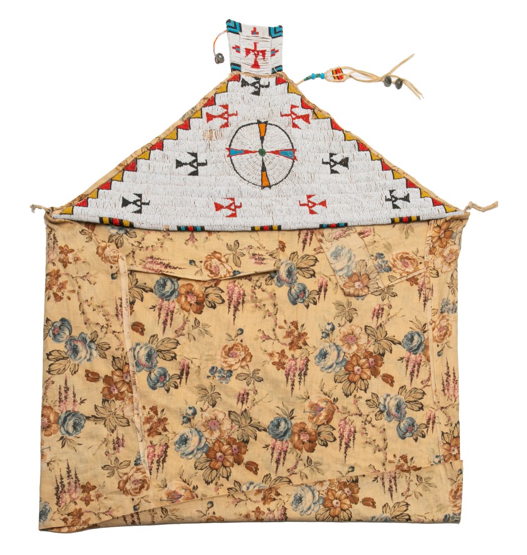 UNIDENTIFIED SOUTHERN ARAPAHO ARTIST, Beaded Soft Cradle, c. 1900: UNIDENTIFIED SOUTHERN ARAPAHO ARTIST Beaded Soft Cradle, c. 1900 cotton fabric, glass beads, hide, metal bells, and cotton thread, overall: 36 x 34 x 0.5 in (91.4 x 86.4 x 1.3 cm) Provenance Important