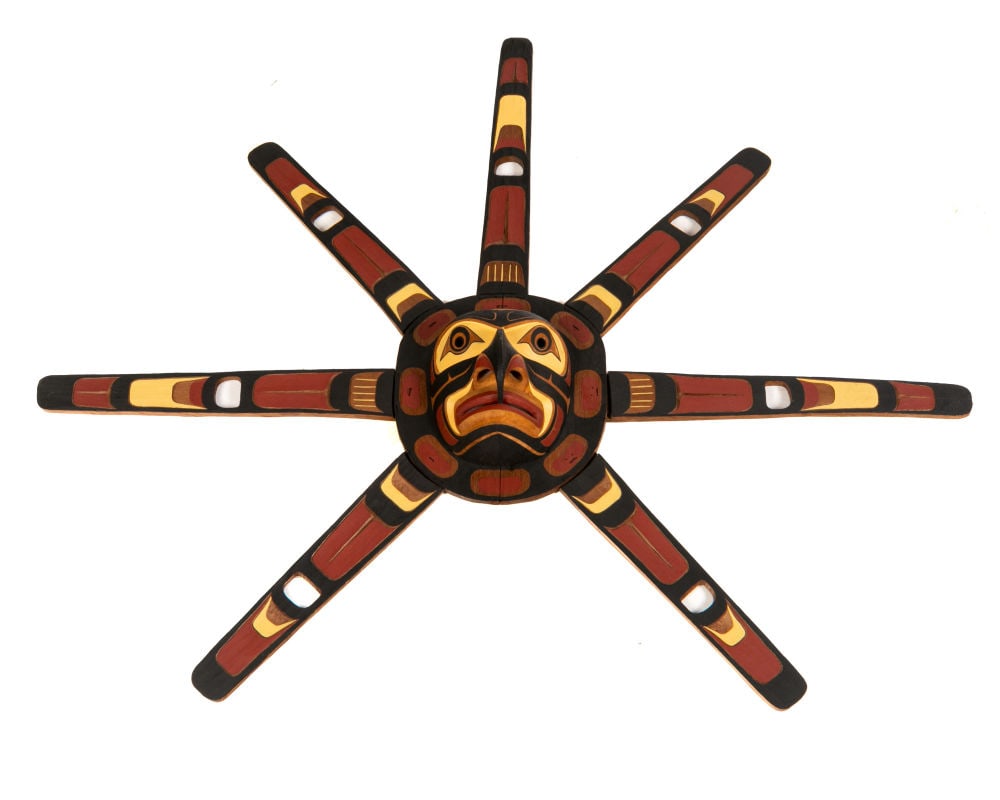 STAN HUNT, KWAKWA̱KA̱ʼWAKW, Kwa-Guithl Sun Mask , 1985: STANLEY “STAN” CLIFFORD HUNT (1954-) KWAKWA̱KA̱ʼWAKW, FORT RUPERT, B.C. Kwa-Guithl Sun Mask , 1985 wood, acrylic, and string, 42.5 x 51 x 6 in (108 x 129.5 x 15.2 cm) signed