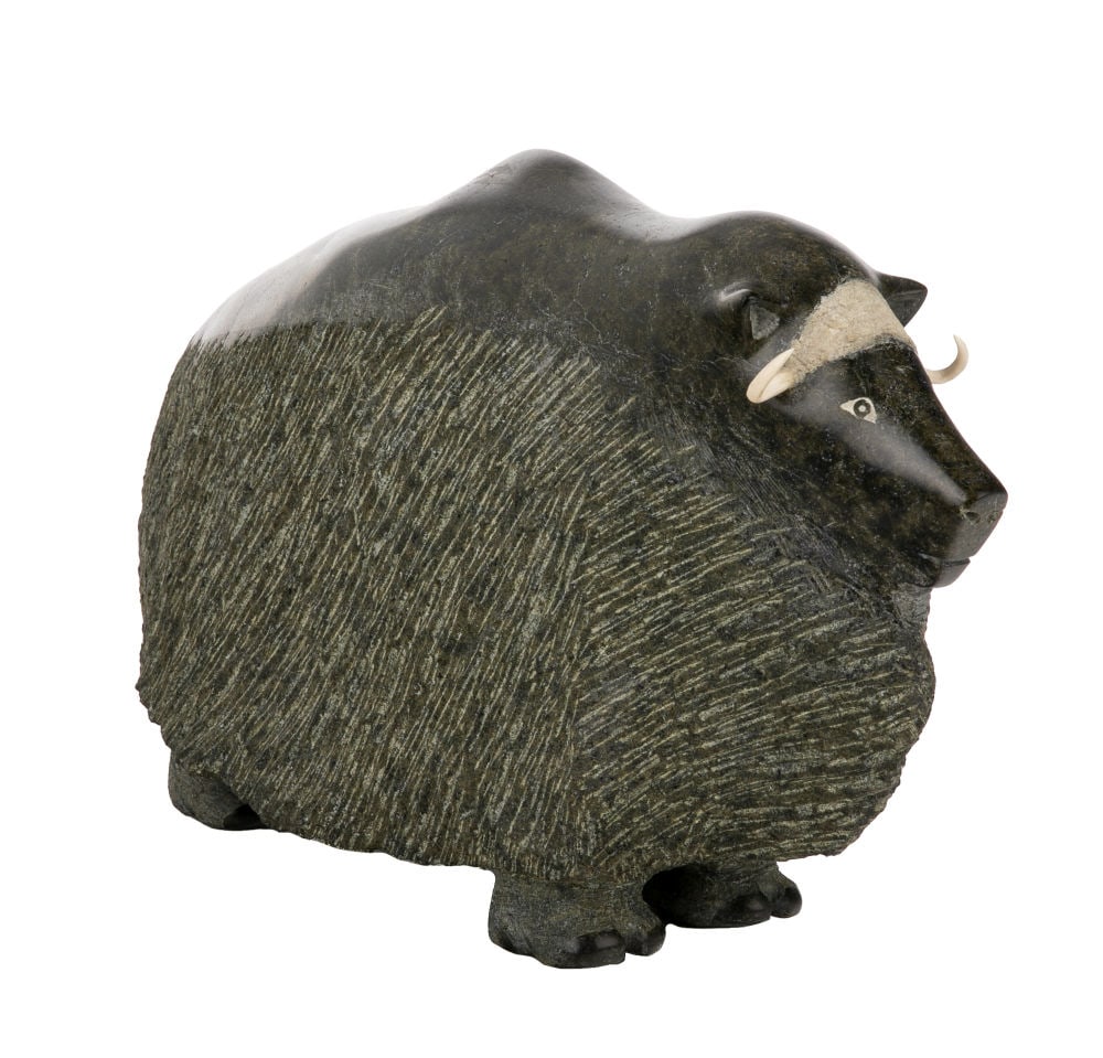 TAKEALOOK TEMELA, INUIT, Windswept Muskox, 1987: TAKEALOOK TEMELA (1935- ) KIMMIRUT (LAKE HARBOUR) Windswept Muskox, 1987 stone and antler, 11.5 x 21 x 6.5 in (29.2 x 53.3 x 16.5 cm) signed and dated, "ᑕᑭᐊᓗ / ᑎᒥ&#