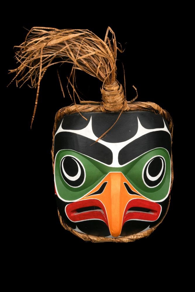 BEAU DICK, KWAKWA̱KA̱ʼWAKW, Owl Mask, 1984: BEAU DICK (1955-2017) KWAKWA̱KA̱ʼWAKW Owl Mask, 1984 cedar wood, cedar bark, and acrylic paint, 12 x 7 x 4.75 in (30.5 x 17.8 x 12.1 cm) signed, titled, and dated, "Beau Dick / Owl Mask