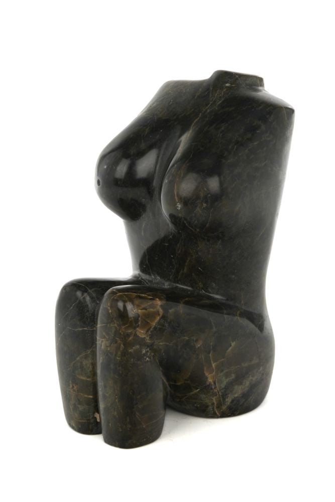 OVILOO TUNNILLIE, INUIT, Torso, mid 1990s: OVILOO TUNNILLIE, R.C.A. (1949-2014) KINNGAIT (CAPE DORSET) Torso, mid 1990s stone, 6.25 x 3.5 x 5.75 in (15.9 x 8.9 x 14.6 cm) signed, "ᐅᕕᓗ / ᑐᓂᓕ". Provenance A Fr