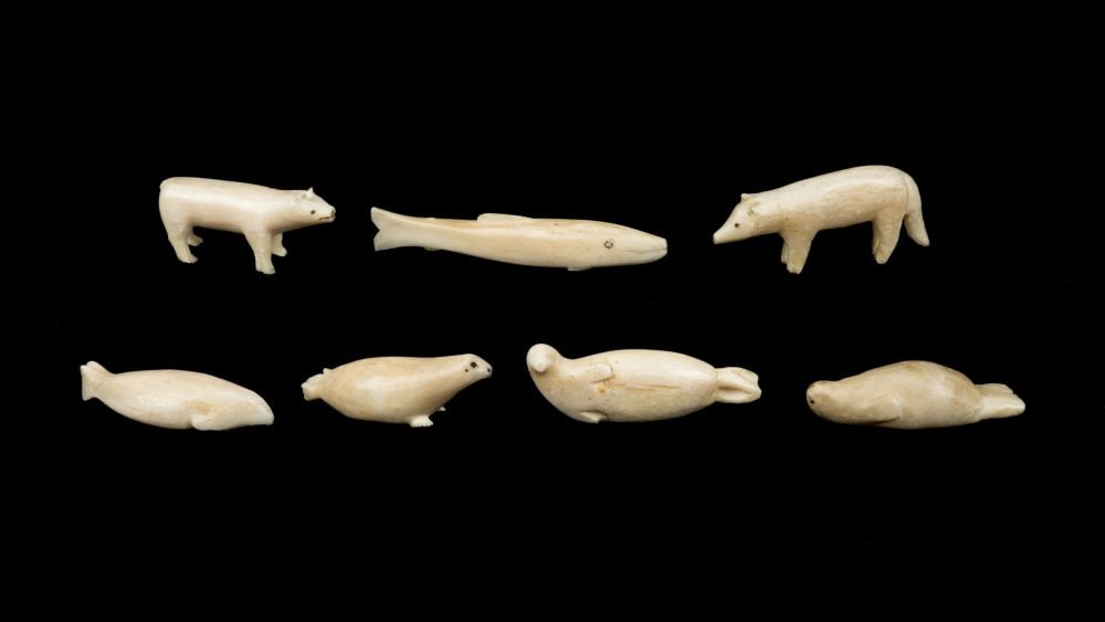 HISTORIC PERIOD INUIT ARTISTS, EASTERN CANADIAN ARCTIC, Group of Seven Arctic Animals, c. 1930s: HISTORIC PERIOD INUIT ARTISTS, EASTERN CANADIAN ARCTIC Group of Seven Arctic Animals, c. 1930s mediums variable: ivory and black pigment / ivory, dimensions variable, the largest (the fish): 0.5 x 3 x