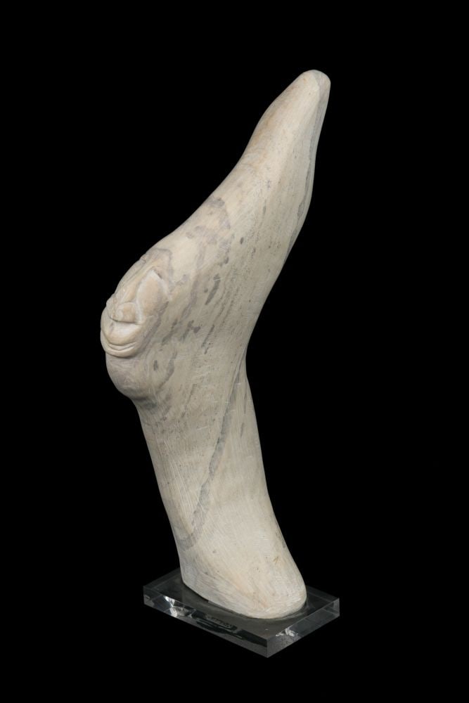 JUTAI TOONOO, INUIT, One Foot, 2000s: JUTAI TOONOO (1959-2015) KINNGAIT (CAPE DORSET) One Foot, 2000s stone, 10 x 2.75 x 5 in (25.4 x 7 x 12.7 cm), measurements reflect dimensions without later added affixed acrylic base titled and signed