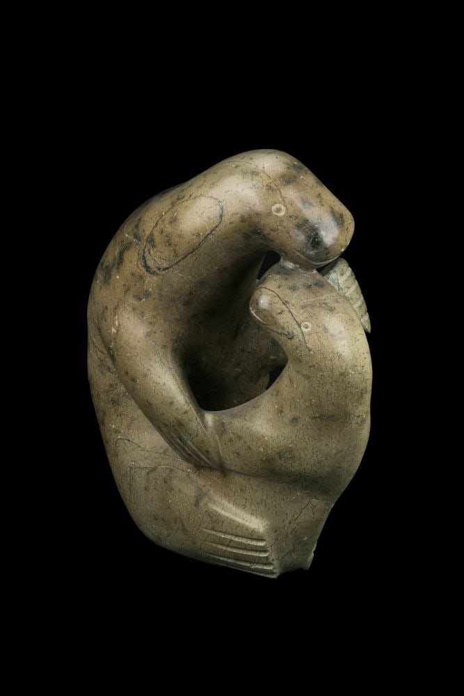 Possibly SHARKY NUNA, INUIT, Mother and Walrus Pup, 1970s: Possibly SHARKY NUNA (1918-1979) KINNGAIT (CAPE DORSET) Mother and Walrus Pup, 1970s stone, 20 x 19 x 10.25 in (50.8 x 48.3 x 26 cm) unsigned. Provenance A Toronto Collection. This wonde