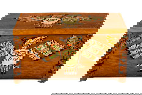 GEORGE NELSON, FIRST NATIONS,Chest with Thunderbird Motifs and Model Totems Corners, c. 1930s / 194: GEORGE NELSON (fl. 1800s-1930s) KWAKWA̱KA̱ʼWAKW Chest with Thunder bird Motifs and Model Totems Corners, c. 1930s / 1940s cedar wood and pigment, 15.5 x 38 x 16.75 in (39.4 x 96.5 x