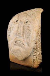 Probably SAMUEL NAHAULAITUQ, INUIT, Grimacing Inuk, 1980s: Probably SAMUEL NAHAULAITUQ (1923-1999) TALOYOAK (SPENCE BAY) Grimacing Inuk, 1980s whale bone and stone, 4.5 x 3 x 3.5 in (11.4 x 7.6 x 8.9 cm) unsigned. Provenance Private Collection, Ontario.