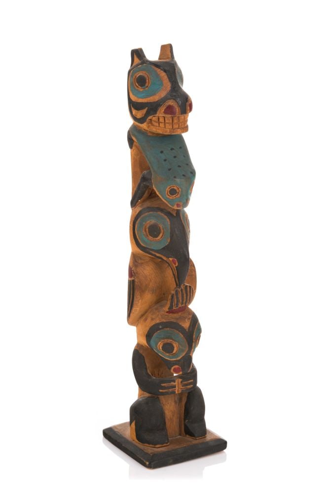 UNIDENTIFIED TLINGIT ARTIST, Model Totem Pole, c. 1920s: UNIDENTIFIED TLINGIT ARTIST Model Totem Pole, c. 1920s yellow cedar and acrylic paint, 10 x 2.5 x 2.5 in (25.4 x 6.3 x 6.3 cm) unsigned. Provenance Collection of John & Joyce Price, Seattle, WA. This 
