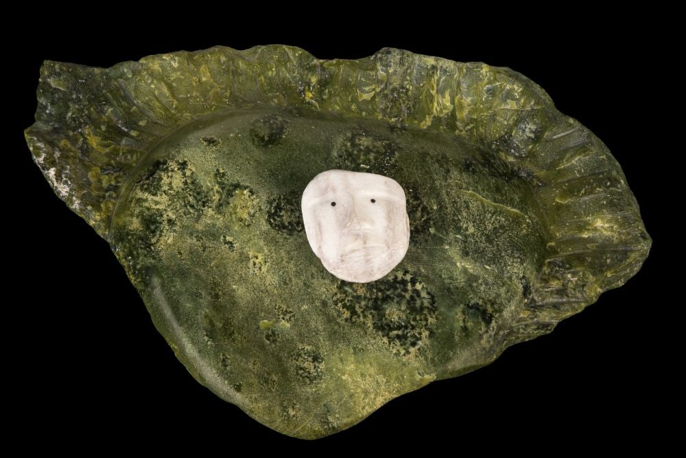 MATIUSIE IYAITUK, INUIT, I Love the Northern Lights, 1997: MATIUSIE IYAITUK (1950-) IVUJIVIK I Love the Northern Lights, 1997 stone, 5 x 21.5 x 13.25 in (12.7 x 54.6 x 33.7 cm) titled, signed, and dated,""I LOVE THE / NORTHERN LIGHTS"/ ᒪᑦᑎ&#