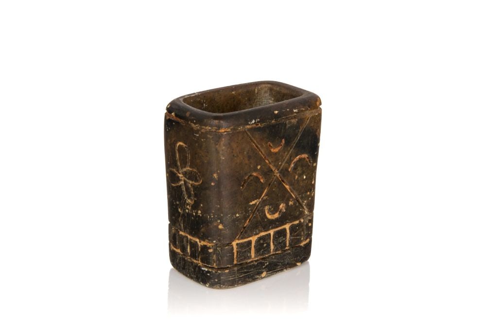 UNIDENTIFIED INUIT ARTIST, Match Holder with Incised Flora and Geometric Motifs , 1950s: UNIDENTIFIED ARTIST, INUKJUAK (PORT HARRISON) Match Holder with Incised Flora and Geometric Motifs , 1950s stone and soap, 2 x 1.75 x 1.25 in (5.1 x 4.4 x 3.2 cm) unsigned. Provenance Private Collecti