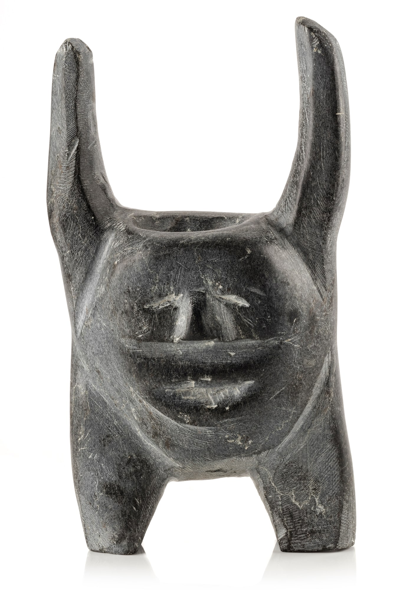 JOHN KAVIK, INUIT, Figure with Upraised Arms, 1972: JOHN KAVIK (1897-1993) KANGIQLINIQ (RANKIN INLET) Figure with Upraised Arms, 1972 stone, 10.25 x 5.75 x 3.25 in (26 x 14.6 x 8.3 cm) unsigned. Provenance Innuit Gallery of Eskimo Art, Toronto; Acquire