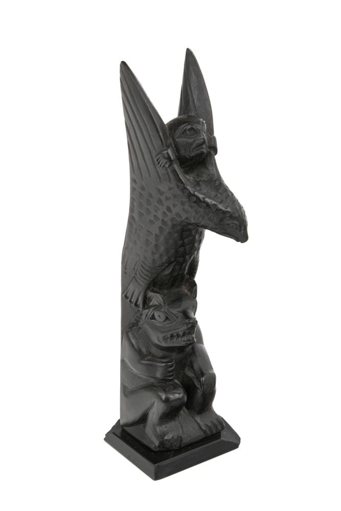CAPTAIN ANDREW BROWN, INUIT, Model Totem Pole, c. 1920s: CAPTAIN ANDREW BROWN (1879-1962) HAIDA Model Totem Pole, c. 1920s argillite, 5.75 x 1.75 x 1.65 in (14.6 x 4.4 x 4.2 cm) unsigned. Provenance Private Collection, Washington, USA. Captain Andrew Brow