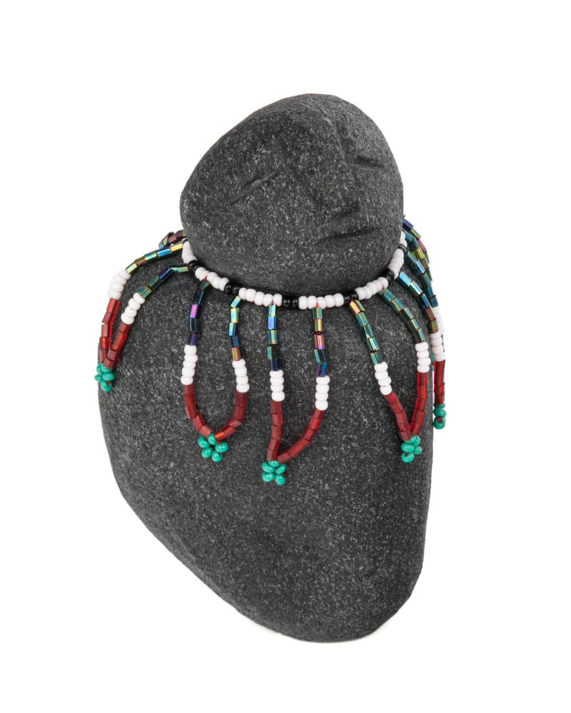 MARY TUTSWEETOK, INUIT, Woman in a Beaded Amautiq, 2000s: MARY TUTSWEETOK (1927-1995) ARVIAT (ESKIMO POINT) Woman in a Beaded Amautiq, 2000s stone, beads, and thread, 4 x 3 x 3.25 in (10.2 x 7.6 x 8.3 cm) signed, "ᒥᐊᕆ". Provenance Collectio