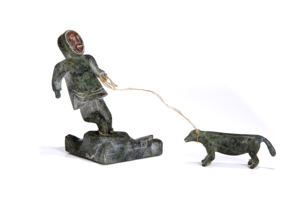 UNIDENTIFIED INUIT ARTIST, Standing Hunter with Inset Face and Dog, c. late 1940s or early 1950s: UNIDENTIFIED INUIT ARTIST, EASTERN CANADIAN ARCTIC Standing Hunter with Inset Face and Dog, c. late 1940s or early 1950s stone, sinew, and inlay, dimensions variable, overall: 4 x 3 x 3 in (10.2 x 7.6