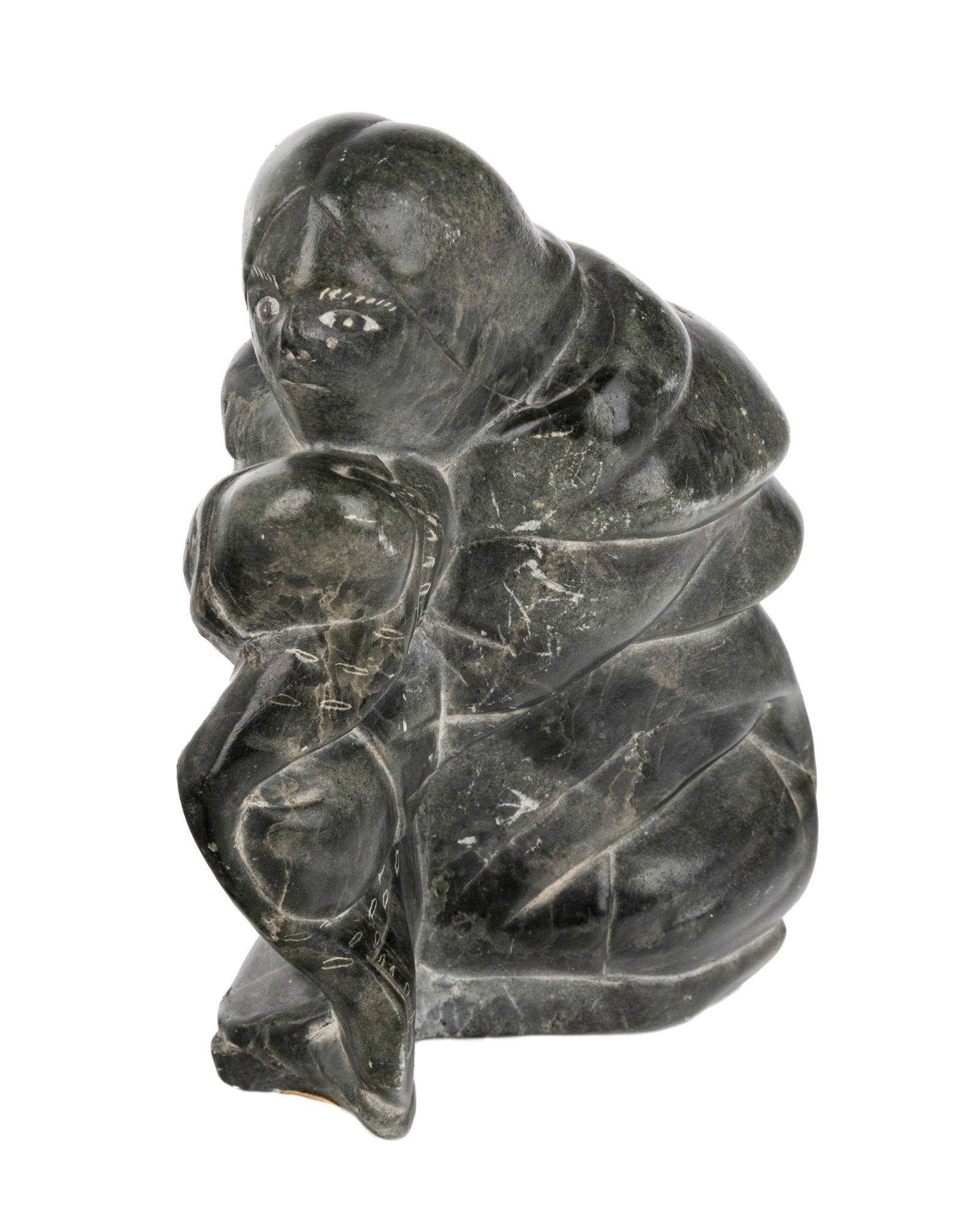 MAKUSI PANGUTU ANAUTA, INUIT, Crouching Woman with Sealskin, 1973: MAKUSI PANGUTU ANAUTA (1939-), PUVIRNITUQ (POVUNGNITUK) / AKULIVIK Crouching Woman with Sealskin, 1973 stone, 6.5 x 3.25 x 5.25 in (16.5 x 8.3 x 13.3 cm) signed and dated, "MARKOSSIE ANN / 73". Proven