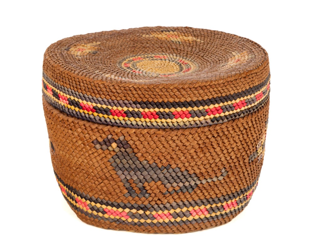 UNIDENTIFIED NUU-CHAH-NULTH ARTIST, Lidded Basket with Dogs and Geometric Pattern, c. 1950s: UNIDENTIFIED NUU-CHAH-NULTH ARTIST Lidded Basket with Dogs and Geometric Pattern, c. 1950s cedar bark, natural and dyed grasses, 4.25 x 6.25 x 6.25 in (10.8 x 15.9 x 15.9 cm) unsigned. Provenance Priv