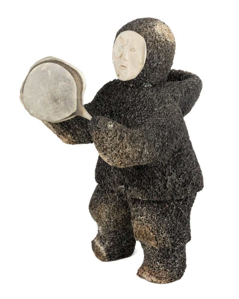 TATEGAL, INUIT, Drum Dancer, 1970s: TATEGAL, IGLULIK (IGLOOLIK) Drum Dancer, 1970s whale bone and antler, 12.5 x 5.5 x 8.5 in (31.8 x 14 x 21.6 cm) given to the artist to the affixed igloo tag. Provenance Private Collection, Toronto; Es