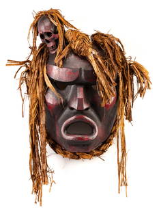 BEAU DICK, FIRST NATIONS, Ba̱k’wa̱s Ghost Mask with Skull, c. 2005-10: BEAU DICK (1955-2017) KWAKWA̱KA̱ʼWAKW Ba̱k’wa̱s Ghost Mask with Skull, c. 2005-10 cedar wood, cedar bark, acrylic paint and string, 31 x 20 x 10 in (78.7 x 50.8 x 25.4 c