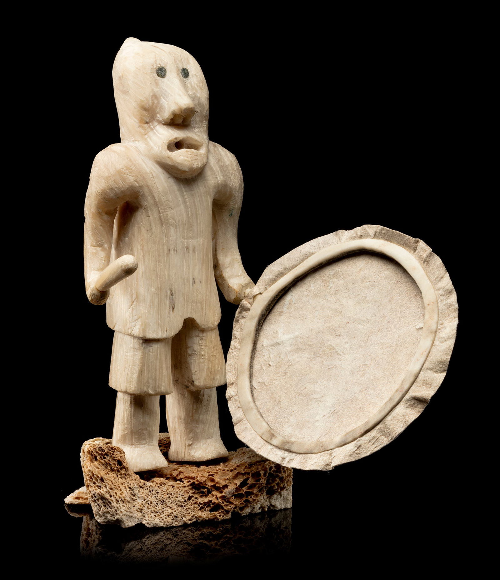 NICK SIKKUARK, INUIT, Drum Dancer, c. mid 1980s: NICK SIKKUARK (1943-2013) UQSUQTUUQ (GJOA HAVEN) Drum Dancer, c. mid 1980s musk ox horn, bone, stone, hide, and antler, 7,25 x 5 x 7.25 in (17.8 x 12.7 x 18.4 cm) signed, "ᓂᑯᓚ ᓯ