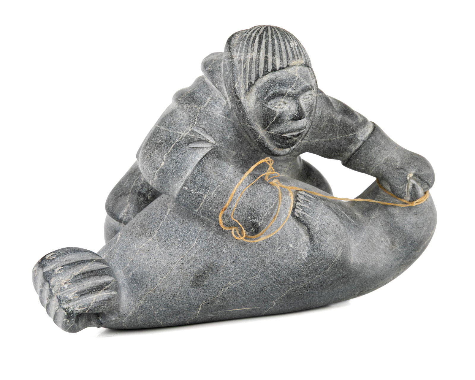 MOSES TALIA QUMA, INUIT, Man Subduing a Seal, 1958: MOSES TALIA QUMA (1920-D) AKULIVIK Man Subduing a Seal, 1958 stone and waxed string, 4.75 x 7.25 x 4.25 in (12.1 x 18.4 x 10.8 cm) inscribed with artist's disc number and signed, "E.9.947 / MOSISE"; w