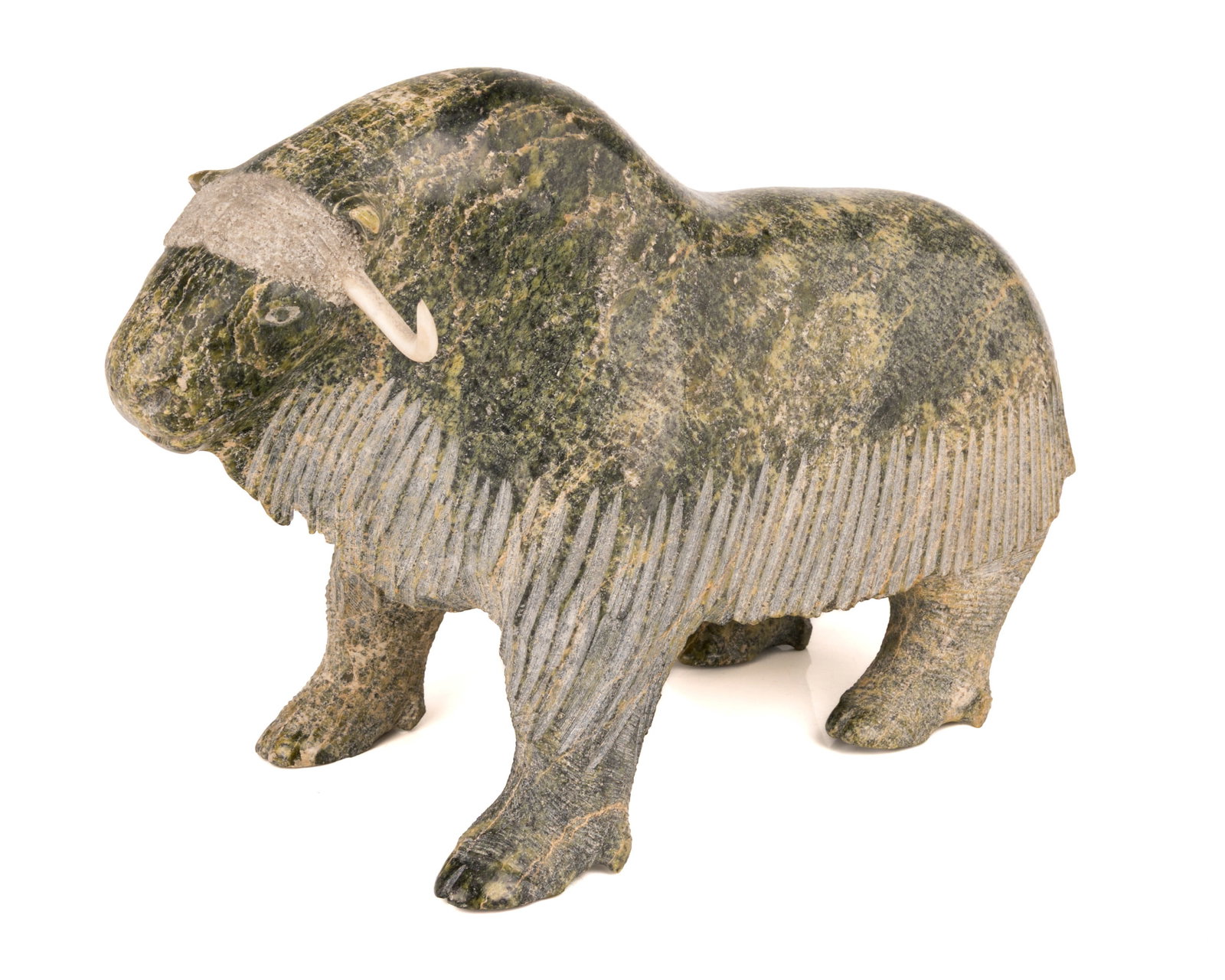 NUYALIAQ QIMIRPIK, INUIT, Standing Muskox, mid 1990s: NUYALIAQ QIMIRPIK (1937-2007) Kimmirut (Lake Harbour) Standing Muskox, mid 1990s stone and antler, 8 x 12.75 x 5.25 in (20.3 x 32.4 x 13.3 cm) signed, "ᓄᔭᓕᐊ / ᑭᒥ