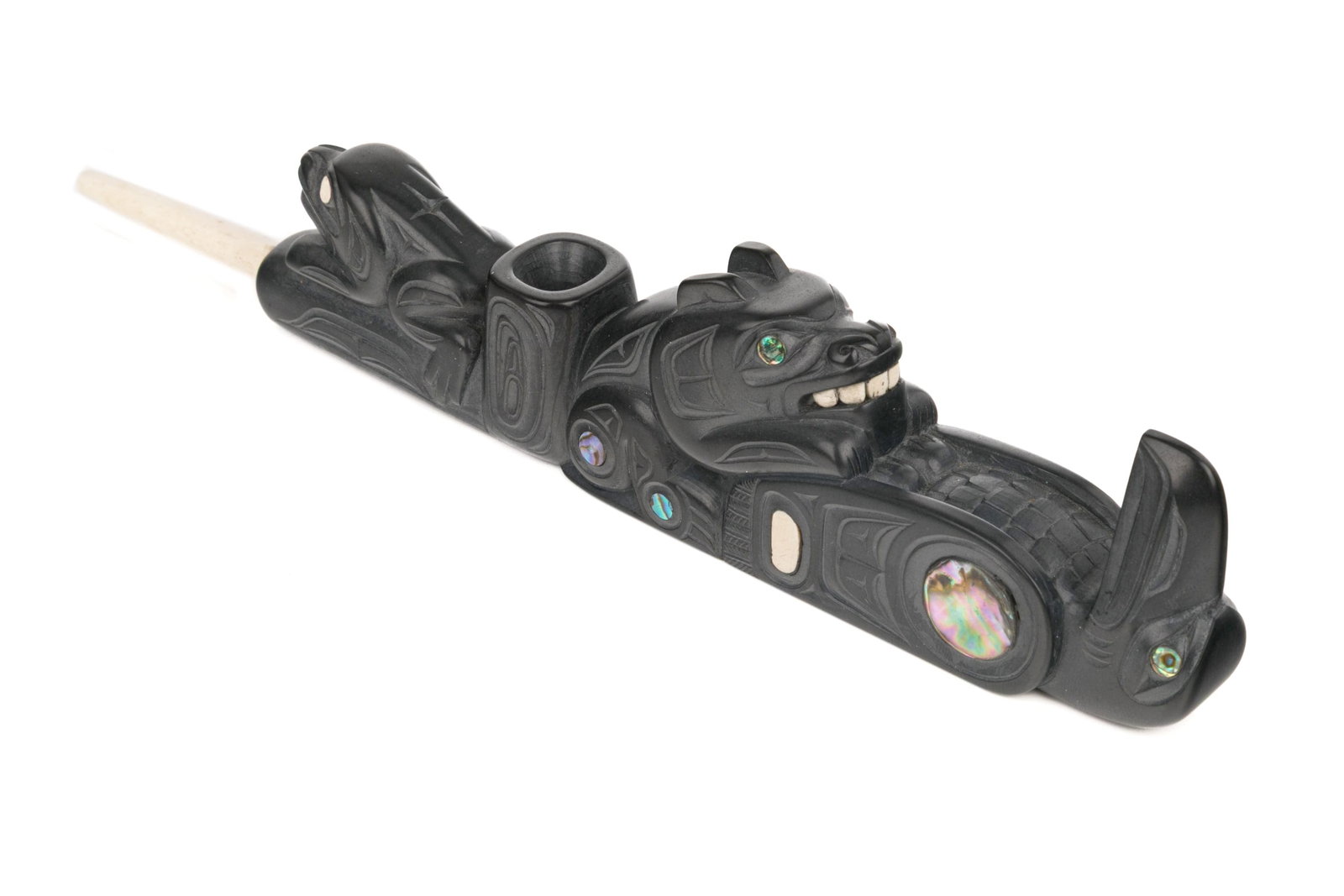 GLEN POLLARD, HAIDA, Pipe with Raven, Bear, and Frog, 1990s: GLEN POLLARD (1957-) SKIDEGATE, HAIDA GWAII Pipe with Raven, Bear, and Frog, 1990s argillite, p?ua shell, and moose bone, 10 x 2.25 x 1 in (25.4 x 5.7 x 2.5 cm) titled, signed, and inscribed, "Haida R
