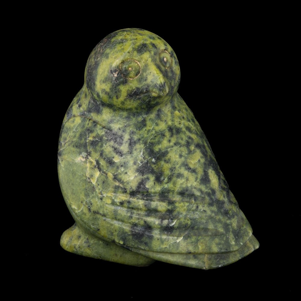 UNIDENTIFIED INUIT ARTIST, KINNGAIT (CAPE DORSET), Owl Looking Back, 1970s: UNIDENTIFIED ARTIST, KINNGAIT (CAPE DORSET) Owl Looking Back, 1970s stone, 5.5 x 5.25 x 3.75 in (14 x 13.3 x 9.5 cm) unsigned; with an affixed sticker, in blue ink, in an unknown hand, "Guild". Proven