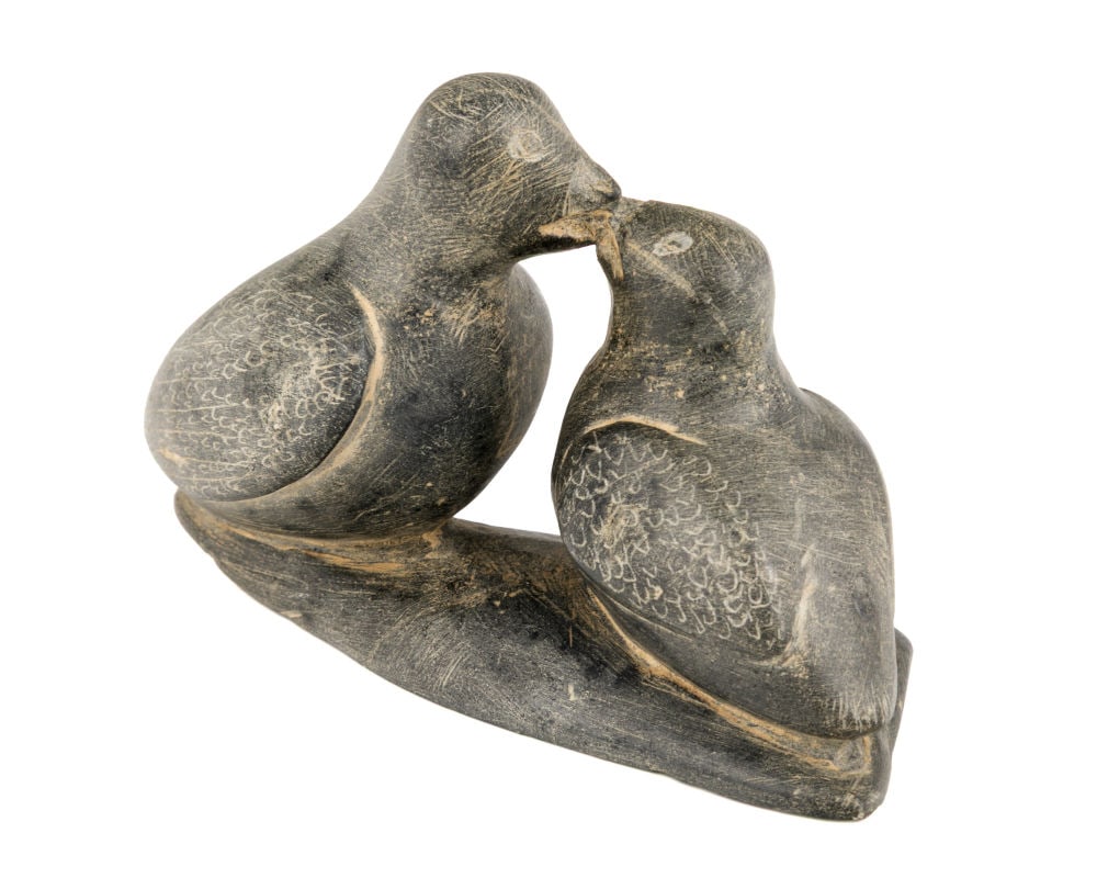 PAULOSIE SIVUAK, INUIT, Mother Bird, Feeding her Hungry Nestling, 1958: PAULOSIE SIVUAK (1930-1986) PUVIRNITUQ (POVUNGNITUK) Mother Bird, Feeding her Hungry Nestling, 1958 stone, 3 x 5.25 x 2 in (7.6 x 13.3 x 5.1 cm) unsigned; with affixed label from La Guilde (The Canadi