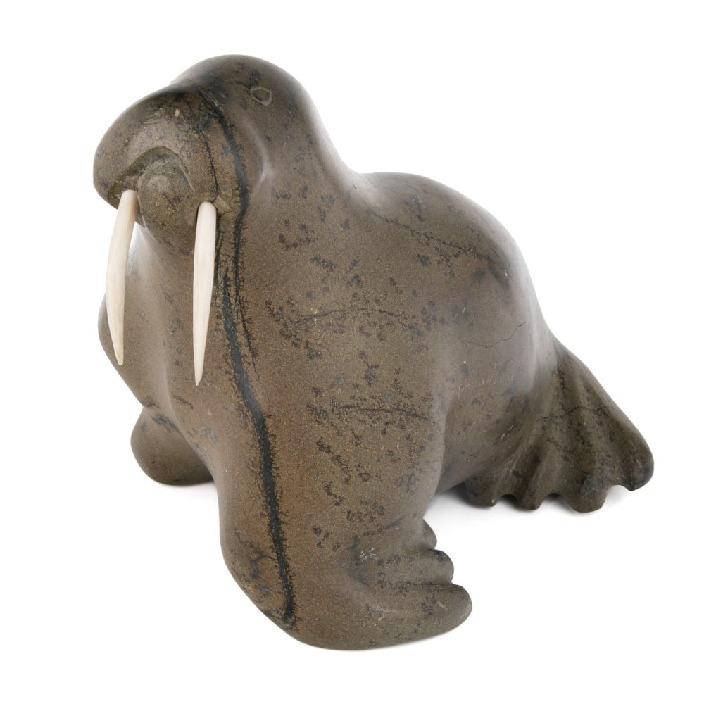ABRAHAM ETUNGAT, INUIT,, Walrus, c. 1970s / early 1980s: ABRAHAM ETUNGAT, R.C.A. (1911-1999) KINNGAIT (CAPE DORSET) Walrus, c. 1970s / early 1980s stone and antler, 9.25 x 8 x 11 in (23.5 x 20.3 x 27.9 cm) signed, "ᐃᑐᒐ". Provenance Private