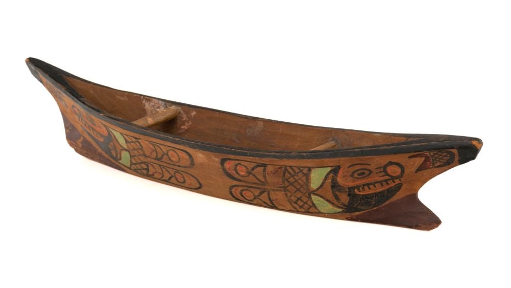 UNIDENTIFIED EYAK OR YAKUTAT TLINGIT ARTIST, Yakutat-Style Model Canoe, c. 1920: UNIDENTIFIED EYAK OR YAKUTAT TLINGIT ARTIST Yakutat-Style Model Canoe, c. 1920 wood and pigment, 2 x 11 x 2.5 in (5.1 x 27.9 x 6.3 cm) unsigned. Provenance Private Collection, NY, USA. Located in th