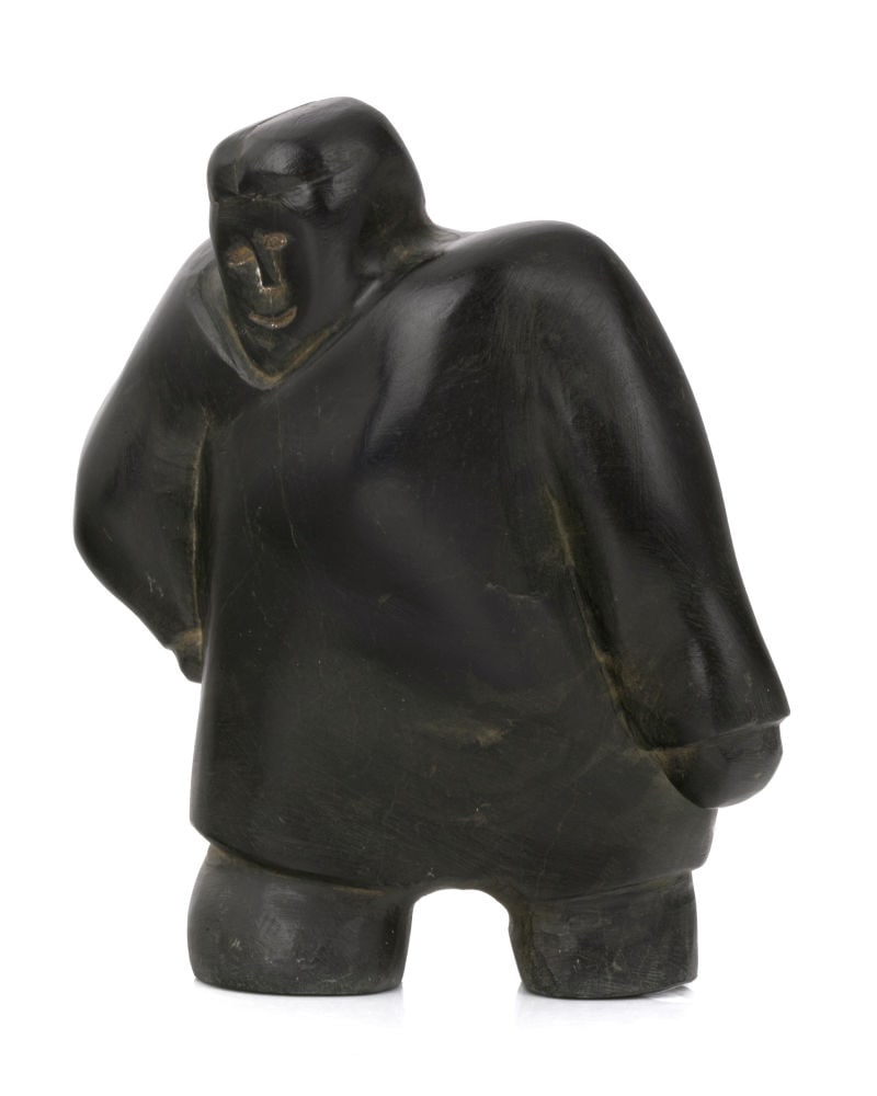 FANNY ARNGNAKIK ARNASUNGAAQ, INUIT, Happy Man, Starting a Journey, c. 1980: FANNY ARNGNAKIK ARNASUNGAAQ (1929-2001) QAMANI'TUAQ (BAKER LAKE) Happy Man, Starting a Journey, c. 1980 stone, 5 x 4.75 x 3.25 in (12.7 x 12.1 x 8.3 cm) signed, "ᐊᓇᑭ" Provenance Priv